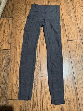 Lululemon Charcoal Gray Leggings with Side Pockets. Size 4